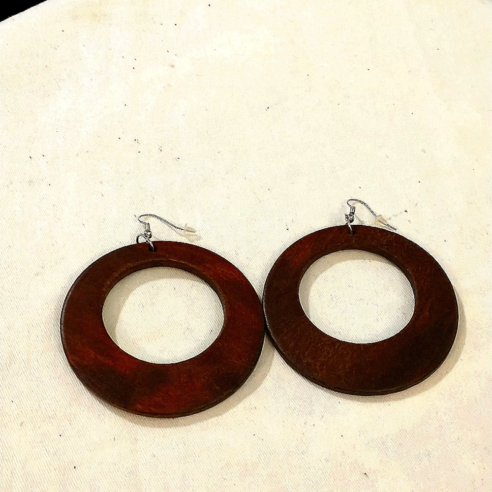 "A whole in one." Wooden earrings by Natural Girls Rock